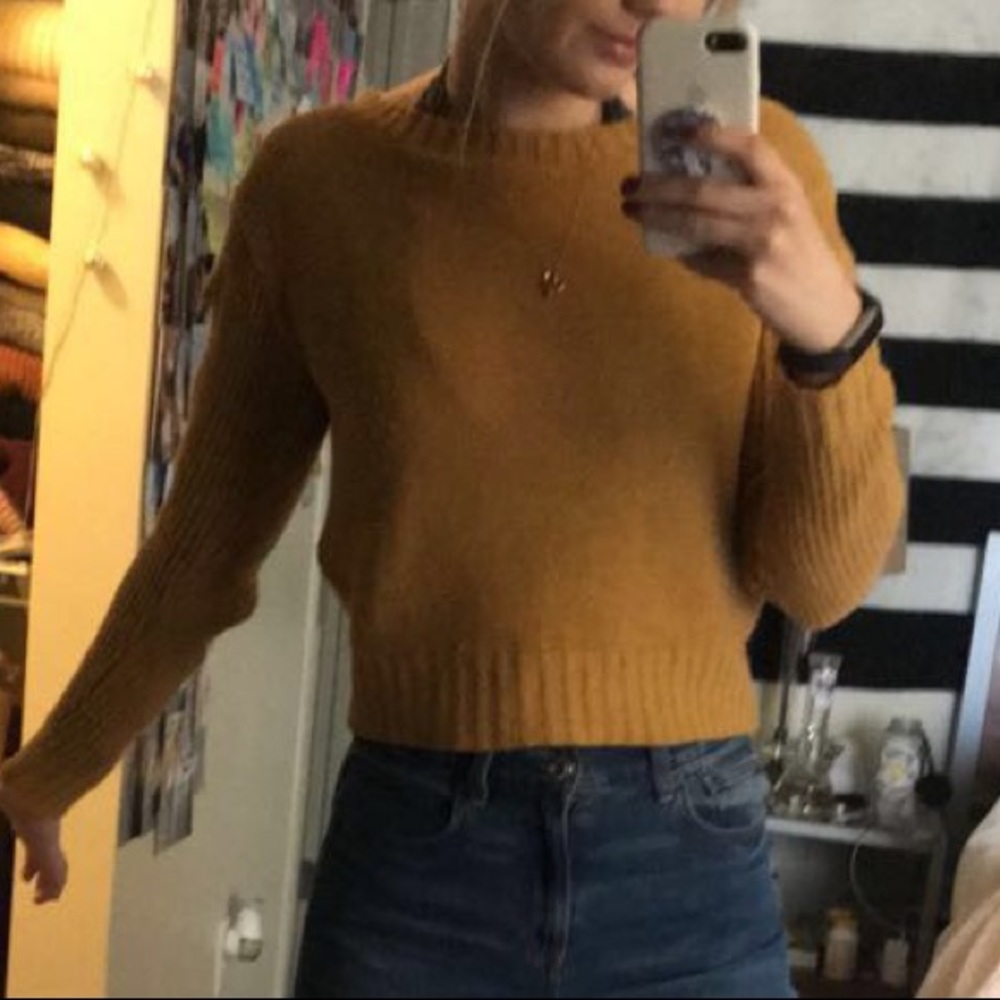 Golden yellow sweater with cutout shoulders